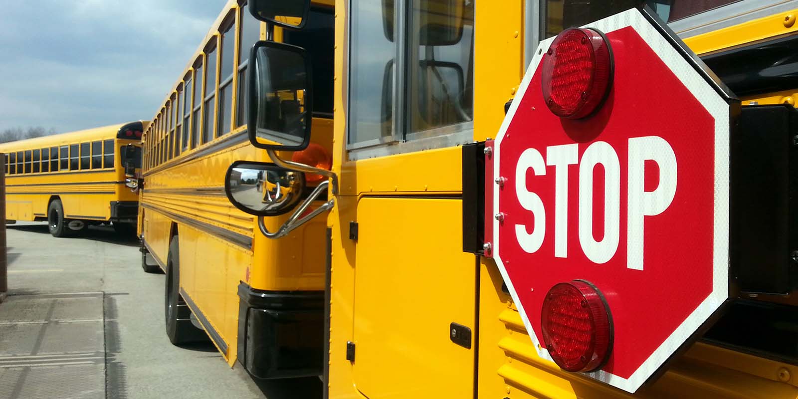 Lamers Bus Lines, Inc. school bus stop sign arm