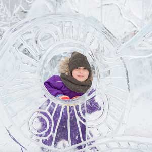 child with ice sculpture